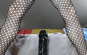 Lovitstretched rides huge black dildo for about 15 mins