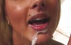After having her loot creampied the blonde squeezes out the hawt millstone to taste it