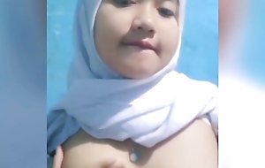 I'm squeezing my breasts thither get naturally big